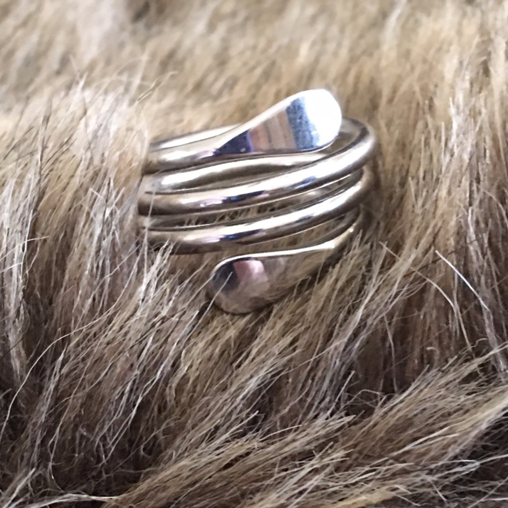 Mirror finish silver tone coil style ring